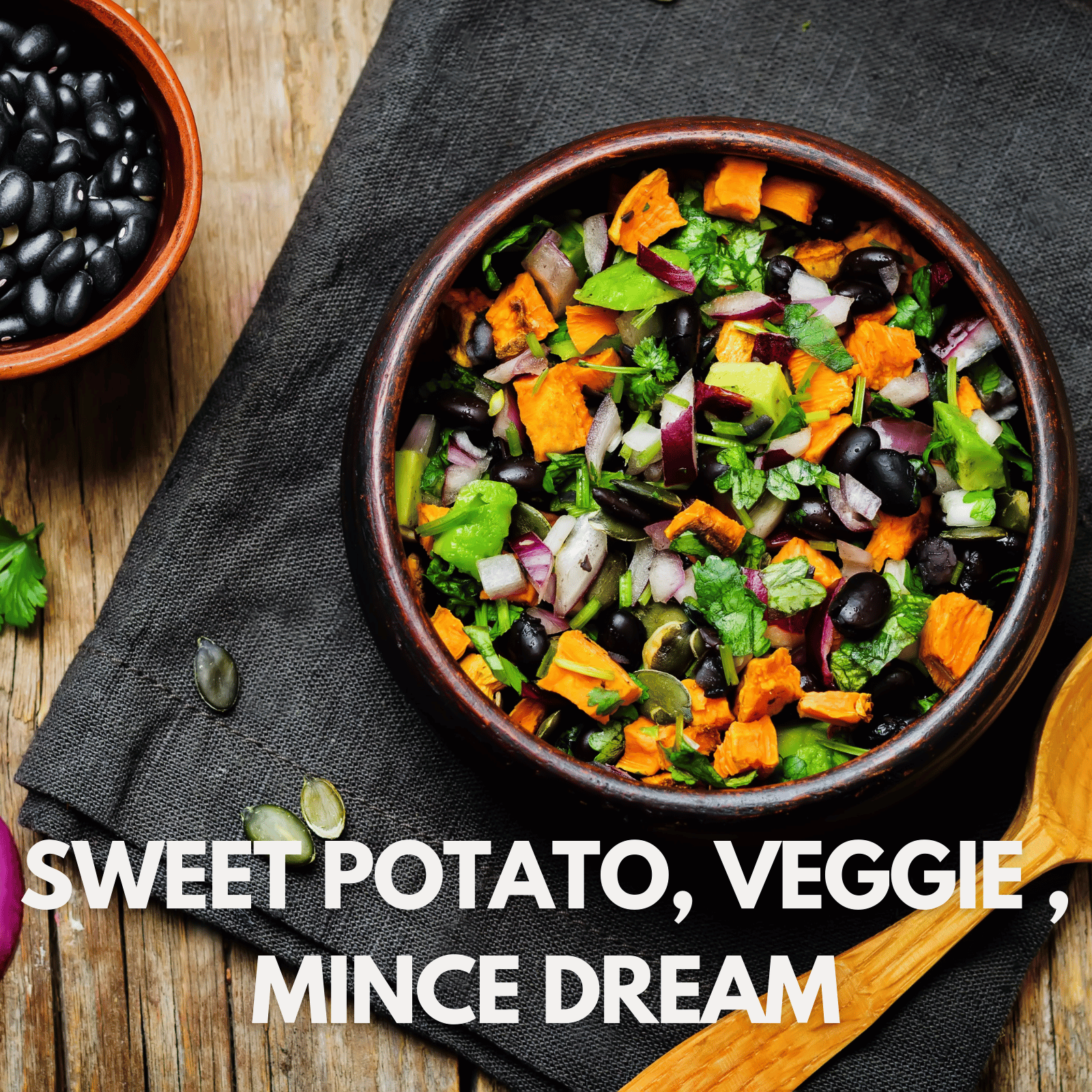 Strength By Fitness amazing sweet potato, veggice mince dream. Filled with 130+ grams of protein, and a very high spc score. The image shows a delicious pot of sweet potatoes, beans, and veggies.